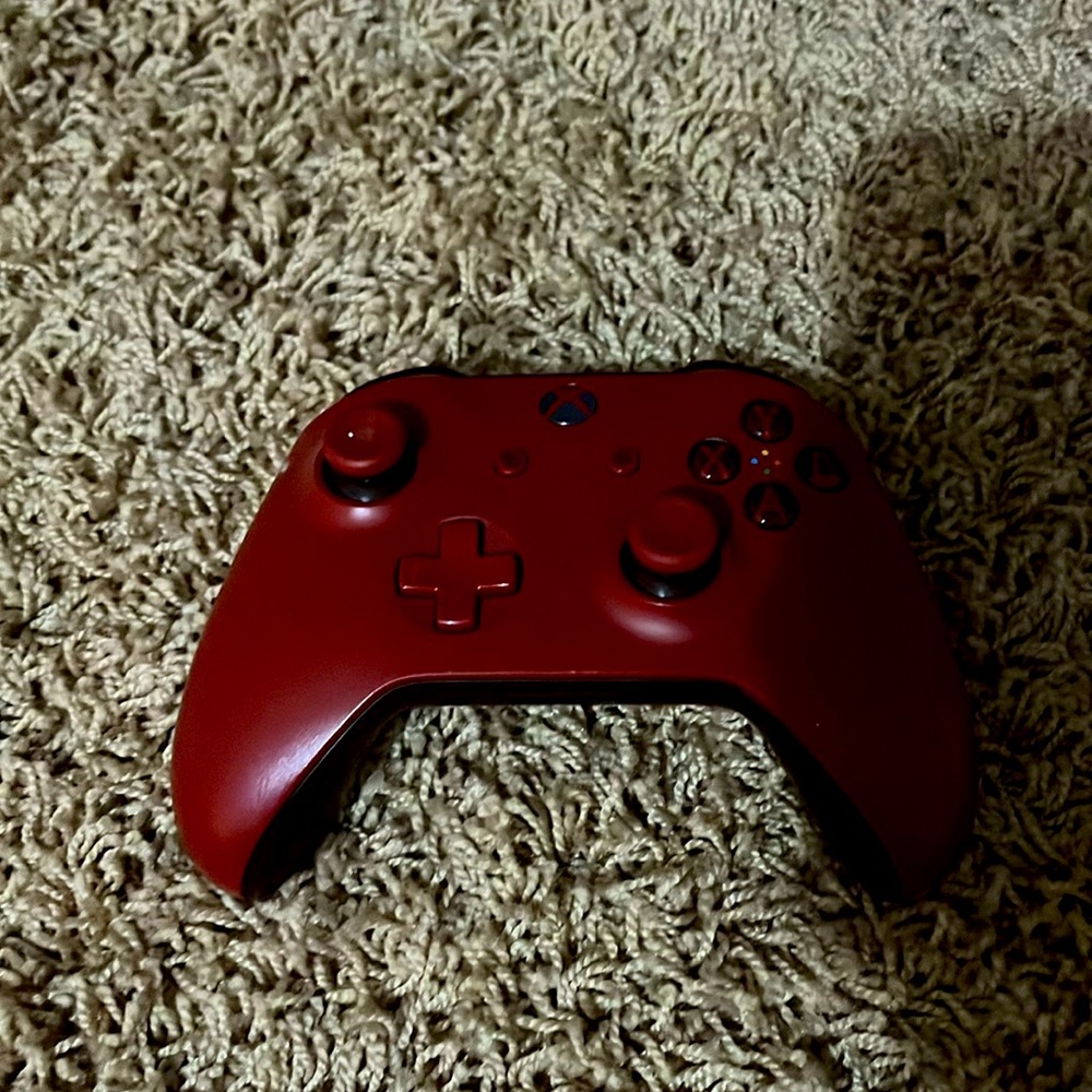 Red Xbox one controller with rechargeable battery